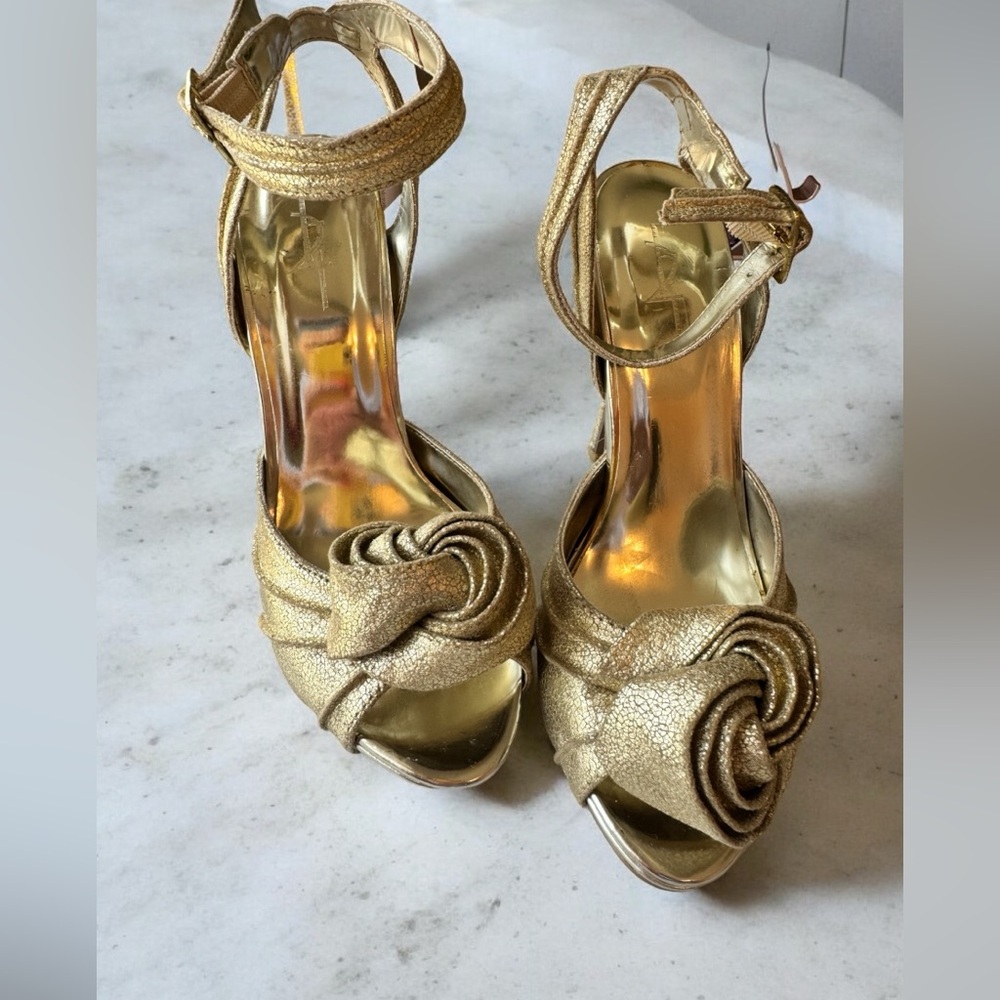 Gold stilettos size 7 great condition.
